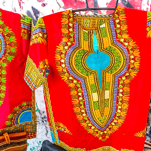 Save up to <span style="color: #4a7931">£10</span> on top African men's top.